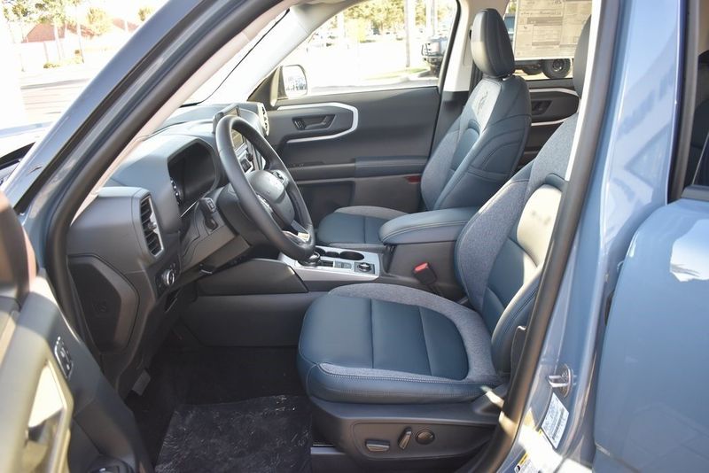 2024 Ford Bronco Sport Outer Banks in a Azure Gray Metallic Tri Coat exterior color and Navy Pierinterior. BEACH BLVD OF CARS beachblvdofcars.com 