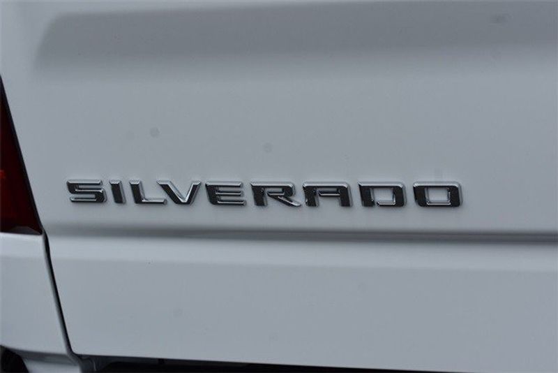 2024 Chevrolet Silverado 1500 WT in a Summit White exterior color and Jet Blk Clthinterior. Raymond Auto Group 888-703-9950 raymonddeals.com 