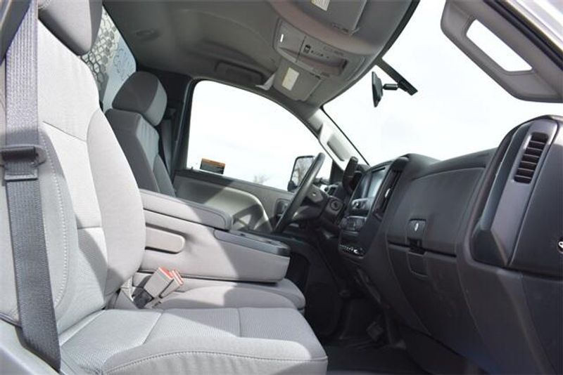 2023 Chevrolet Silverado 5500HD Work Truck in a Summit White exterior color and Dark Ash Seats With Jet Black Interior Accentsinterior. Raymond Auto Group 888-703-9950 raymonddeals.com 