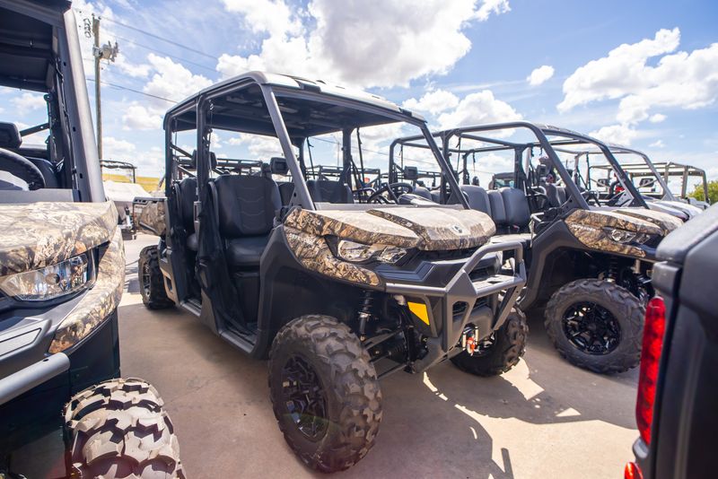 2024 CAN-AM DEFENDER MAX XT HD9 WILDLAND CAMO in a CAMO exterior color. Family PowerSports (877) 886-1997 familypowersports.com 
