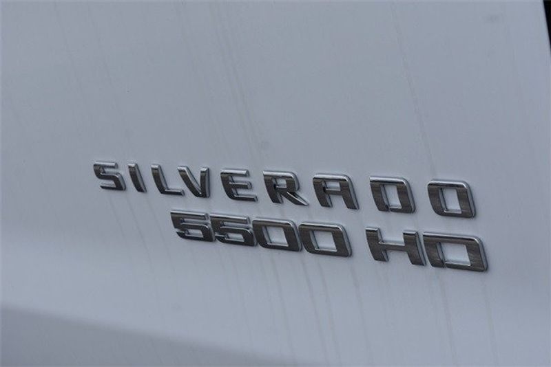 2023 Chevrolet Silverado 5500HD Work Truck in a Summit White exterior color and Dark Ash Seats With Jet Black Interior Accentsinterior. Raymond Auto Group 888-703-9950 raymonddeals.com 