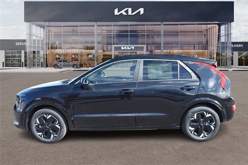 2024 Kia Niro EV Wind in a Aurora Black exterior color and Charcoalinterior. Raymond Auto Group 888-703-9950 raymonddeals.com 