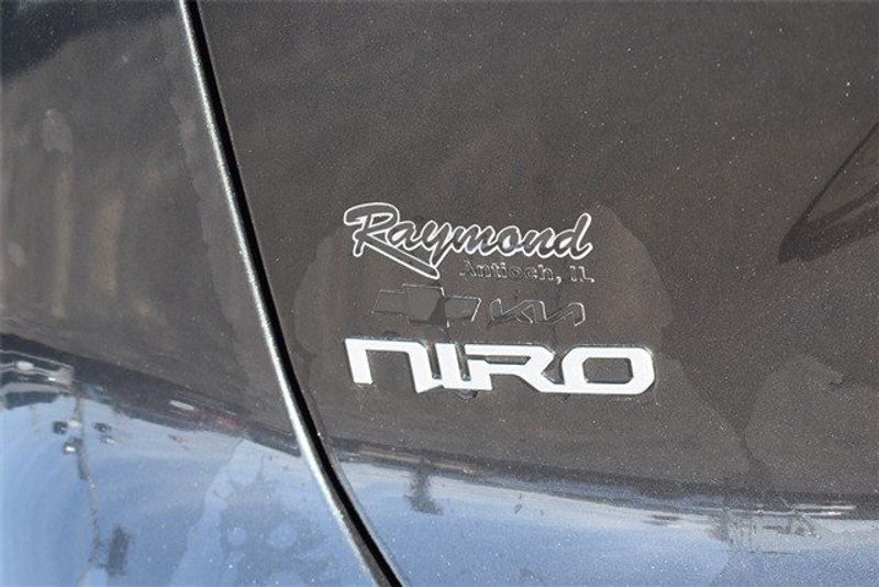 2023 Kia Niro EV Wind in a Graphite Gray exterior color and Charcoalinterior. Raymond Auto Group 888-703-9950 raymonddeals.com 
