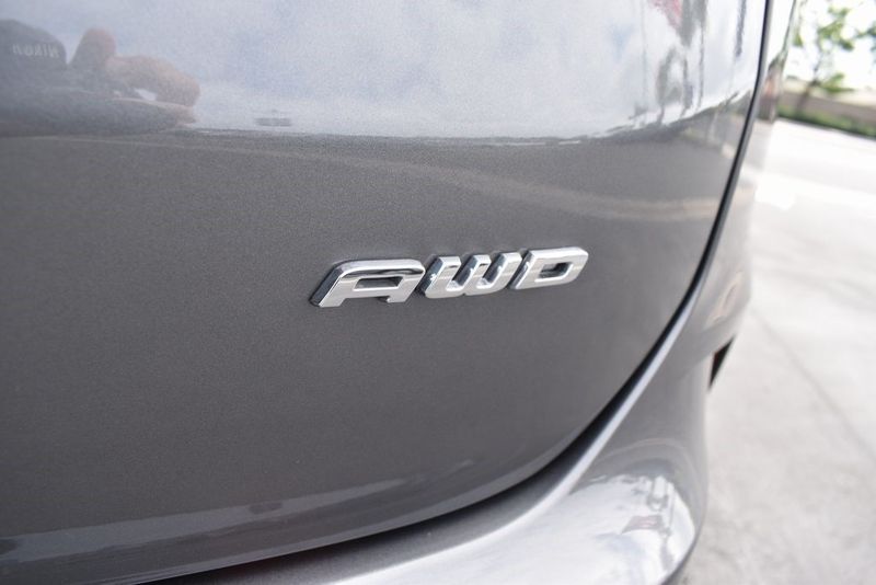 2023 Ford Edge SEL in a Carbonized Gray Metallic exterior color and Ebonyinterior. BEACH BLVD OF CARS beachblvdofcars.com 