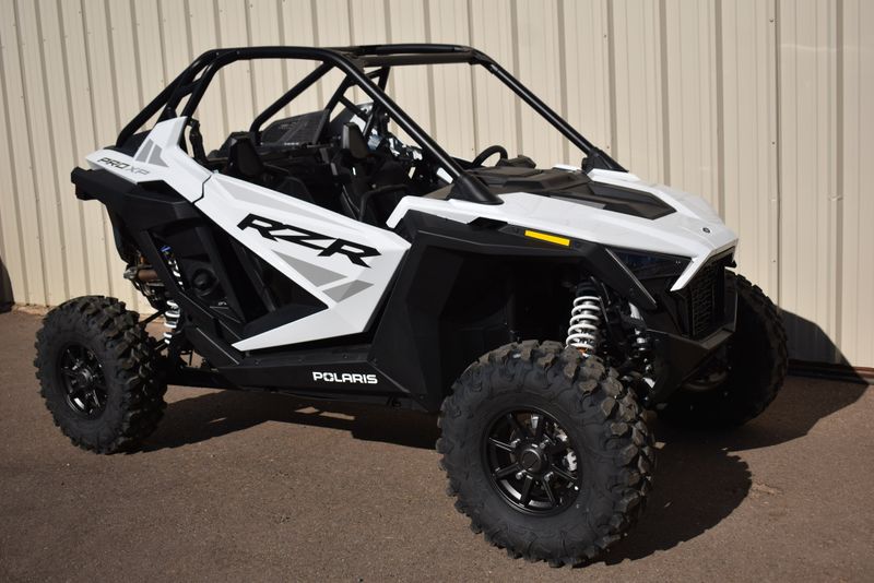 2022 POLARIS RZR PRO XP SPORT  WHITE LIGHTNING in a WHITE exterior color. Family PowerSports (877) 886-1997 familypowersports.com 