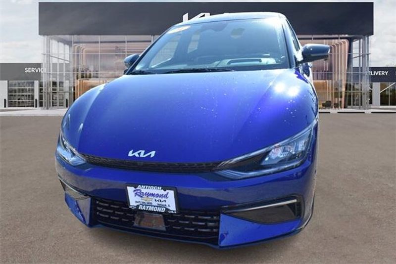 2024 Kia EV6 GT-Line in a Yacht Blue exterior color and Blackinterior. Raymond Auto Group 888-703-9950 raymonddeals.com 