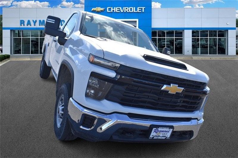 2024 Chevrolet Silverado 2500HD Work Truck in a Summit White exterior color and Jet Blackinterior. Raymond Auto Group 888-703-9950 raymonddeals.com 