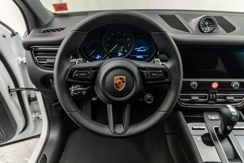 2024 Porsche Macan T in a White exterior color and Black/Bordeaux Redinterior. Lotus Manhattan 347-395-5714 lotusmanhattan.com 