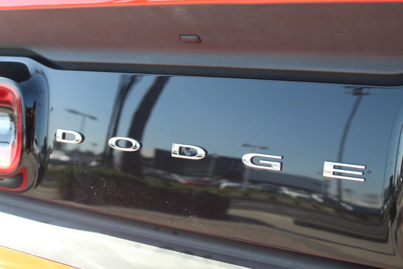 2018 Dodge Challenger SRT Demon in a Go Mango exterior color and Blackinterior. BEACH BLVD OF CARS beachblvdofcars.com 