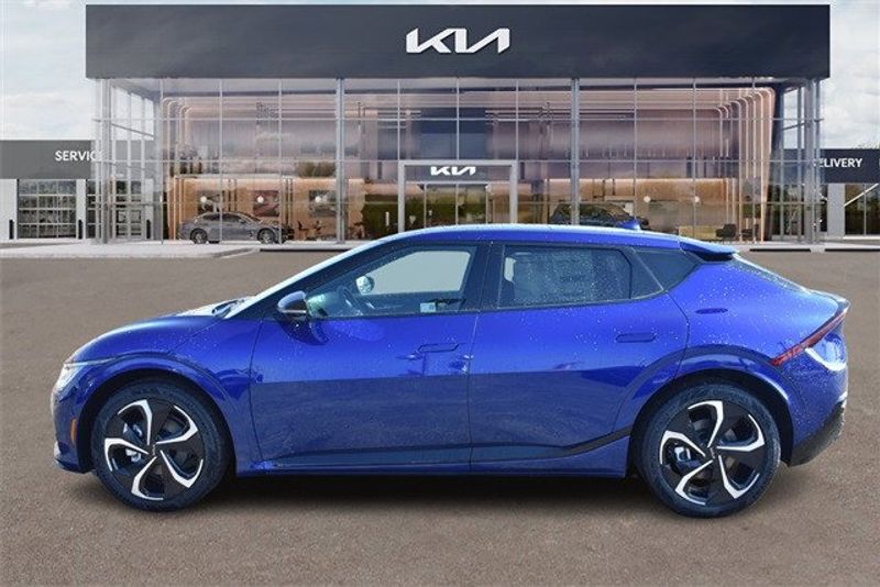 2024 Kia EV6 GT-Line in a Yacht Blue exterior color and Blackinterior. Raymond Auto Group 888-703-9950 raymonddeals.com 