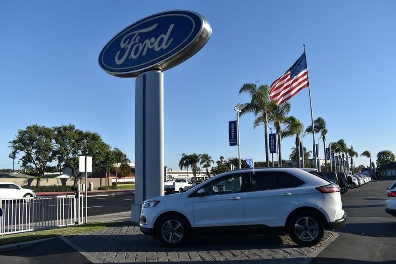 2023 Ford Edge SEL in a Oxford White exterior color and Ebonyinterior. BEACH BLVD OF CARS beachblvdofcars.com 