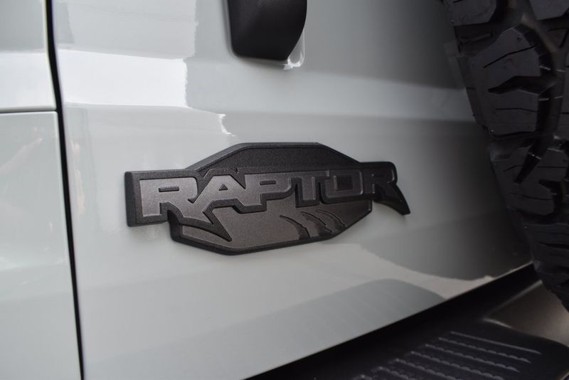 2023 Ford Bronco Raptor in a Cactus Gray exterior color and Black Onyxinterior. BEACH BLVD OF CARS beachblvdofcars.com 