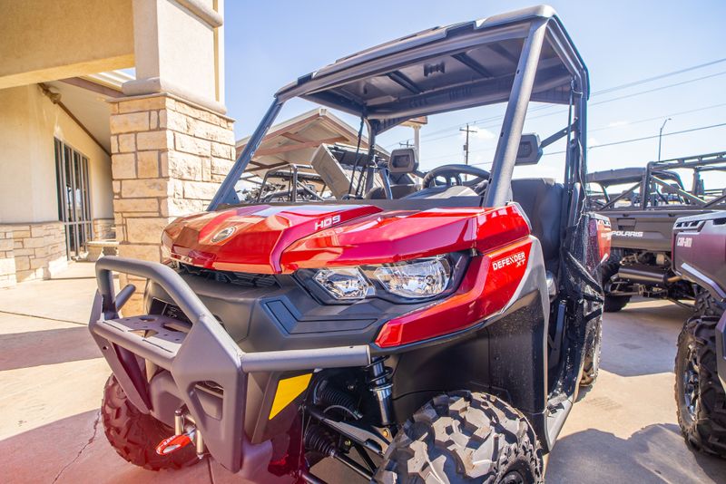 2024 CAN-AM DEFENDER XT HD9 FIERY RED  in a RED exterior color. Family PowerSports (877) 886-1997 familypowersports.com 