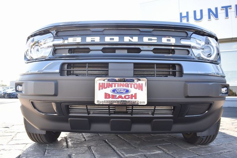 2024 Ford Bronco Sport Outer Banks in a Azure Gray Metallic Tri Coat exterior color and Navy Pierinterior. BEACH BLVD OF CARS beachblvdofcars.com 