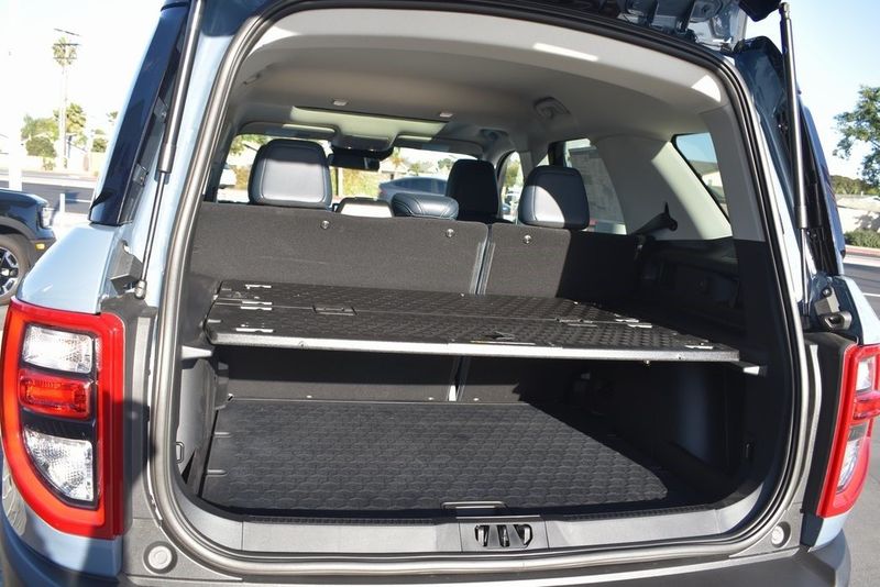 2024 Ford Bronco Sport Outer Banks in a Azure Gray Metallic Tri Coat exterior color and Navy Pierinterior. BEACH BLVD OF CARS beachblvdofcars.com 