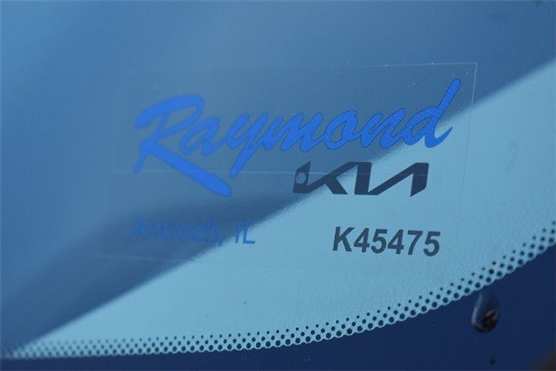 2023 Kia Niro EV Wave in a Mineral Blue exterior color and Light Grayinterior. Raymond Auto Group 888-703-9950 raymonddeals.com 