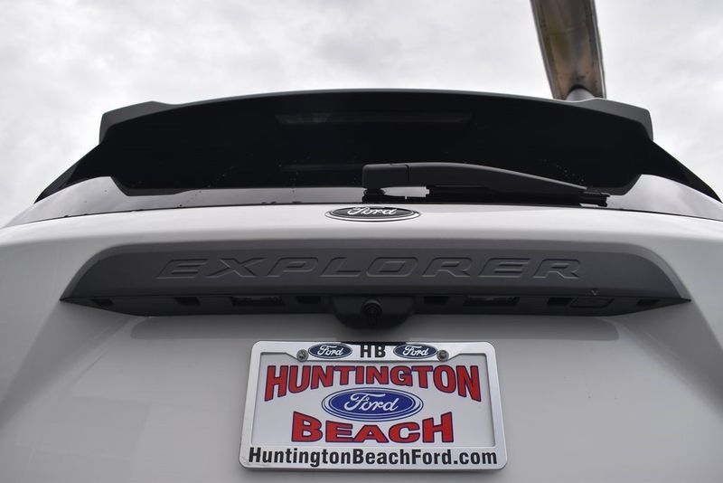 2023 Ford Explorer Timberline in a Star White Metallic Tri Coat exterior color and Ebonyinterior. BEACH BLVD OF CARS beachblvdofcars.com 