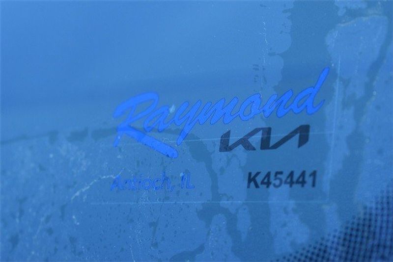 2023 Kia Forte LXS in a Snow White Pearl exterior color and Blackinterior. Raymond Auto Group 888-703-9950 raymonddeals.com 