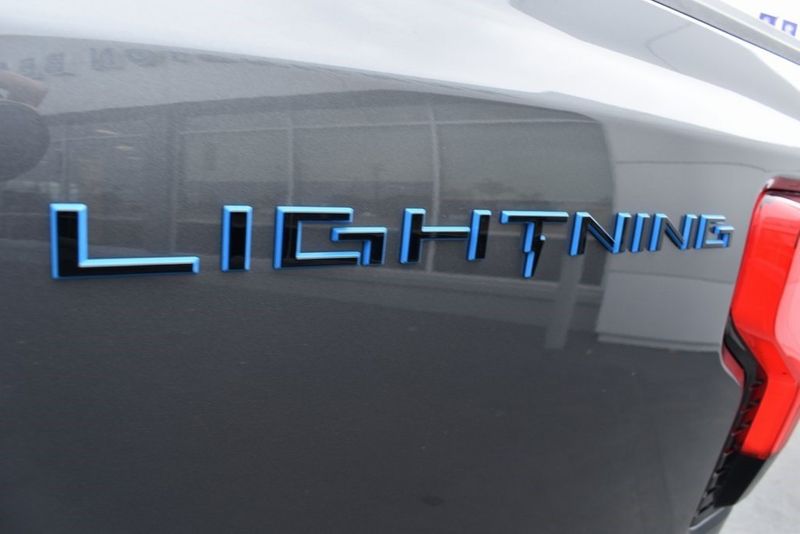 2023 Ford F-150 Lightning XLT in a Gray Metallic exterior color and Medium Dark Slateinterior. BEACH BLVD OF CARS beachblvdofcars.com 