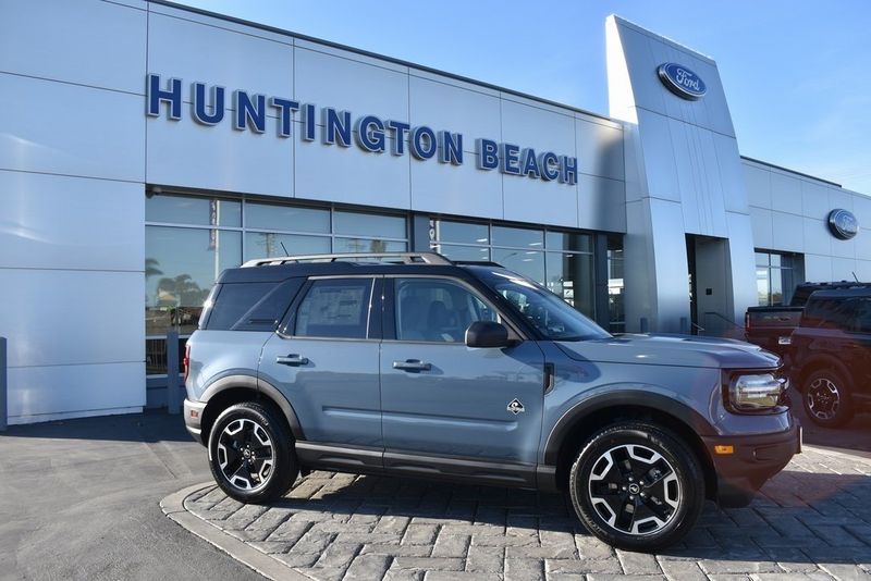 2024 Ford Bronco Sport Outer Banks in a Azure Gray Metallic Tri Coat exterior color and Navy Pierinterior. BEACH BLVD OF CARS beachblvdofcars.com 