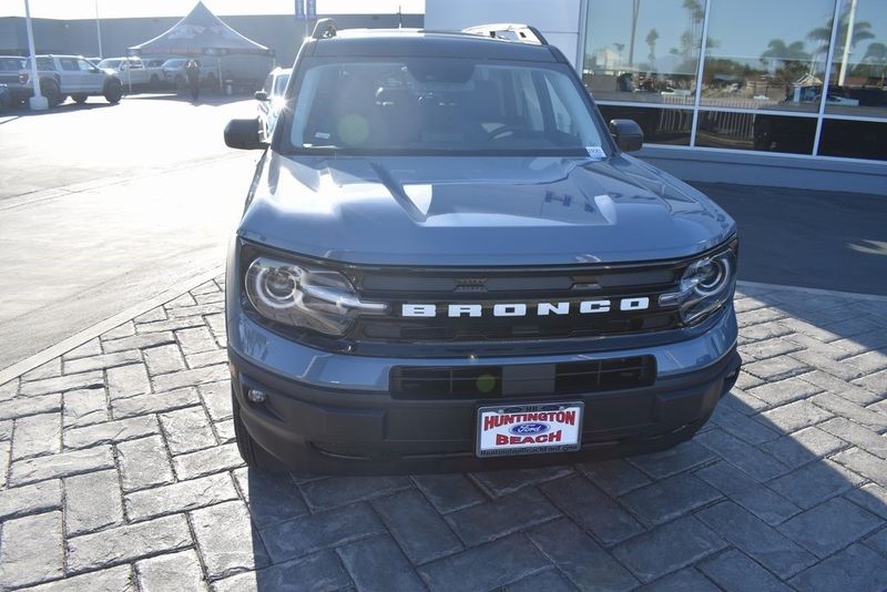 2024 Ford Bronco Sport Outer Banks in a Azure Gray Metallic Tri Coat exterior color and Navy Pierinterior. BEACH BLVD OF CARS beachblvdofcars.com 