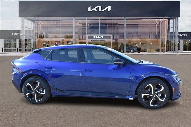 2024 Kia EV6 GT-Line in a Yacht Blue exterior color and Blackinterior. Raymond Auto Group 888-703-9950 raymonddeals.com 