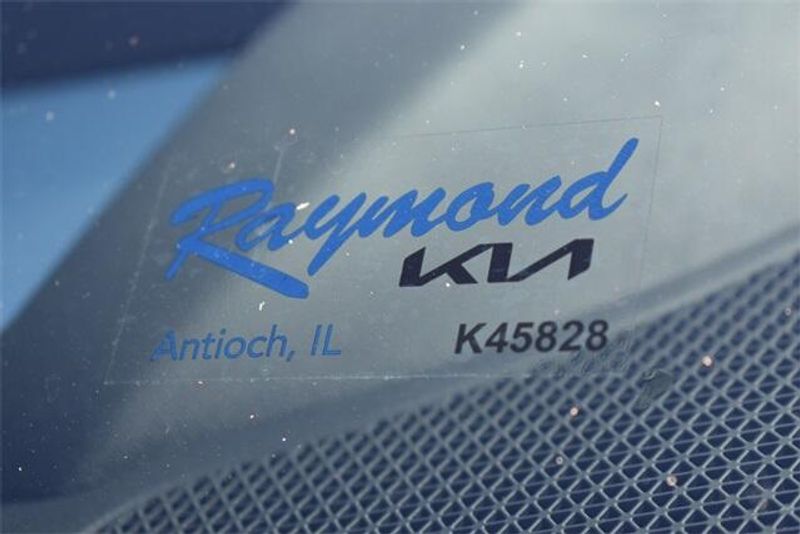 2024 Kia EV6 GT-Line in a Yacht Blue exterior color and Blackinterior. Raymond Auto Group 888-703-9950 raymonddeals.com 