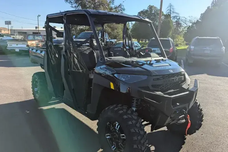 2025 POLARIS RANGER CREW XP 1000 TEXAS EDITION BLACK CRYSTAL in a BLACK CRYSTAL exterior color. Family PowerSports (877) 886-1997 familypowersports.com 