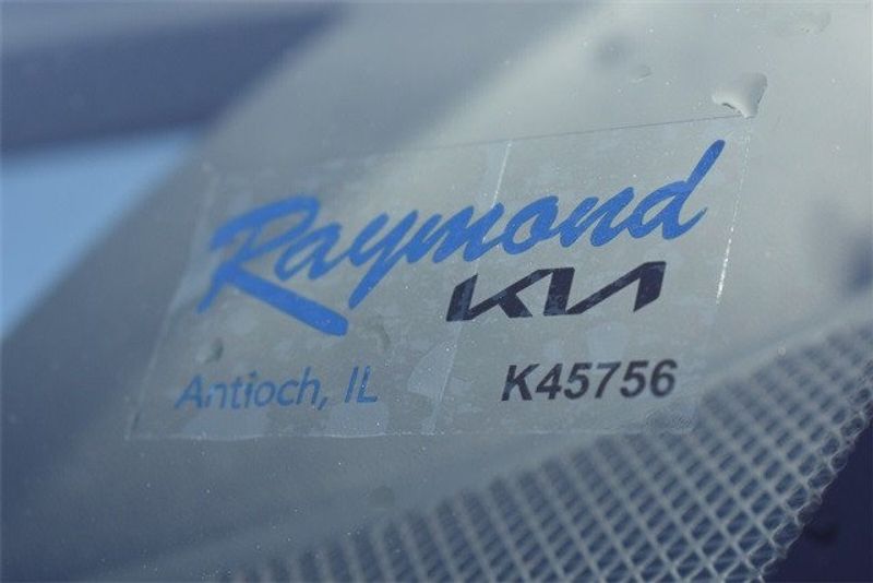 2024 Kia EV6 GT-Line in a Yacht Blue exterior color and Blackinterior. Raymond Auto Group 888-703-9950 raymonddeals.com 