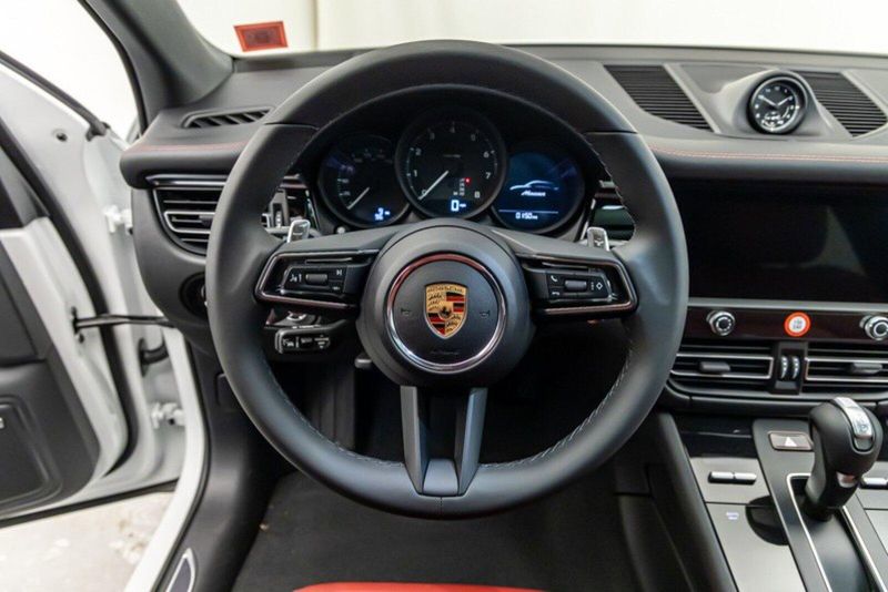 2024 Porsche Macan  in a White exterior color and Black/Bordeaux Redinterior. Lotus Manhattan 347-395-5714 lotusmanhattan.com 