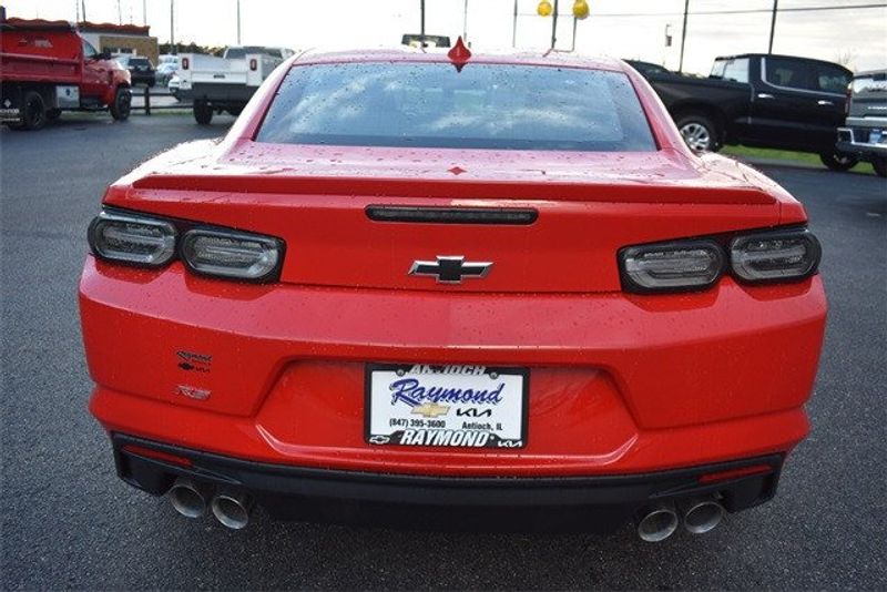 2024 Chevrolet Camaro 1LT in a Red Hot exterior color and Jet Blackinterior. Raymond Auto Group 888-703-9950 raymonddeals.com 