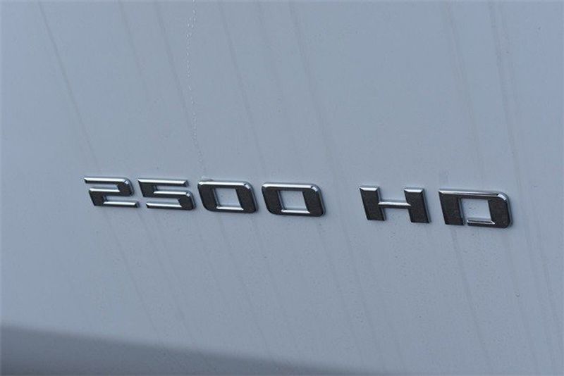 2023 Chevrolet Silverado 2500HD Work Truck in a Summit White exterior color and Blackinterior. Raymond Auto Group 888-703-9950 raymonddeals.com 