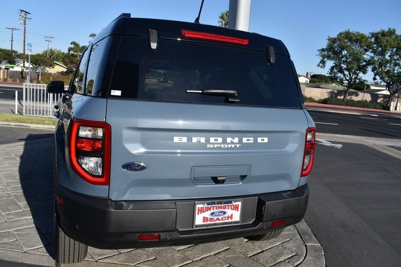 2024 Ford Bronco Sport Outer Banks in a Azure Gray Metallic Tri Coat exterior color and Navy Pierinterior. BEACH BLVD OF CARS beachblvdofcars.com 