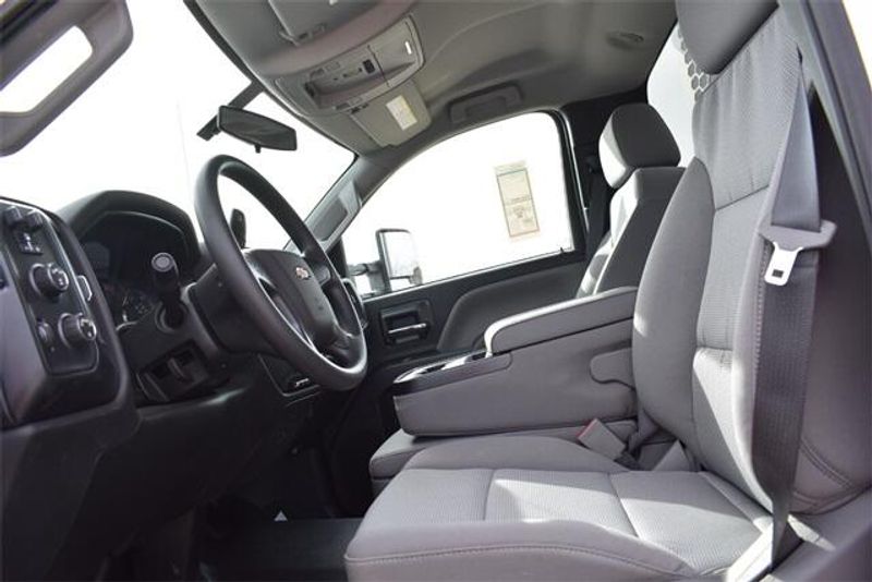 2023 Chevrolet Silverado 5500HD Work Truck in a Summit White exterior color and Dark Ash Seats With Jet Black Interior Accentsinterior. Raymond Auto Group 888-703-9950 raymonddeals.com 