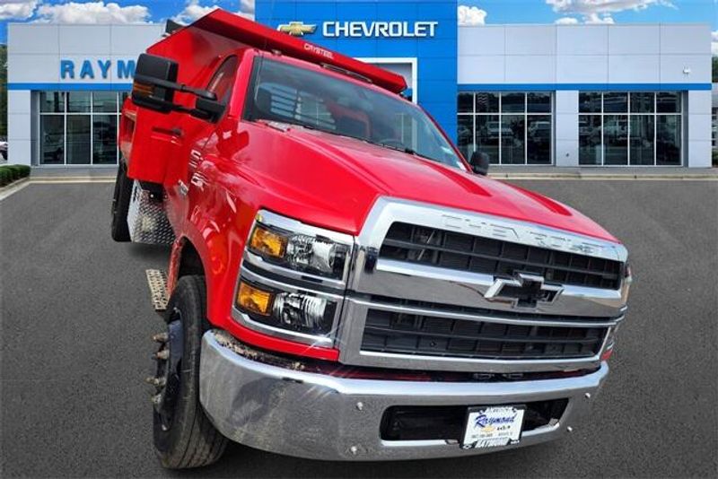 2023 Chevrolet Silverado 4500HD Work Truck in a Red exterior color and Dark Ash Seats With Jet Black Interior Accentsinterior. Raymond Auto Group 888-703-9950 raymonddeals.com 