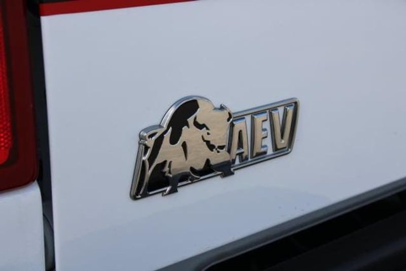 2023 RAM 2500 Laramie Crew Cab 4x4 in a Bright White exterior color and Blackinterior. BEACH BLVD OF CARS beachblvdofcars.com 