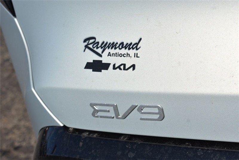 2024 Kia EV9 Land in a Ivory exterior color and Gry Syntex Lth Seatsinterior. Raymond Auto Group 888-703-9950 raymonddeals.com 