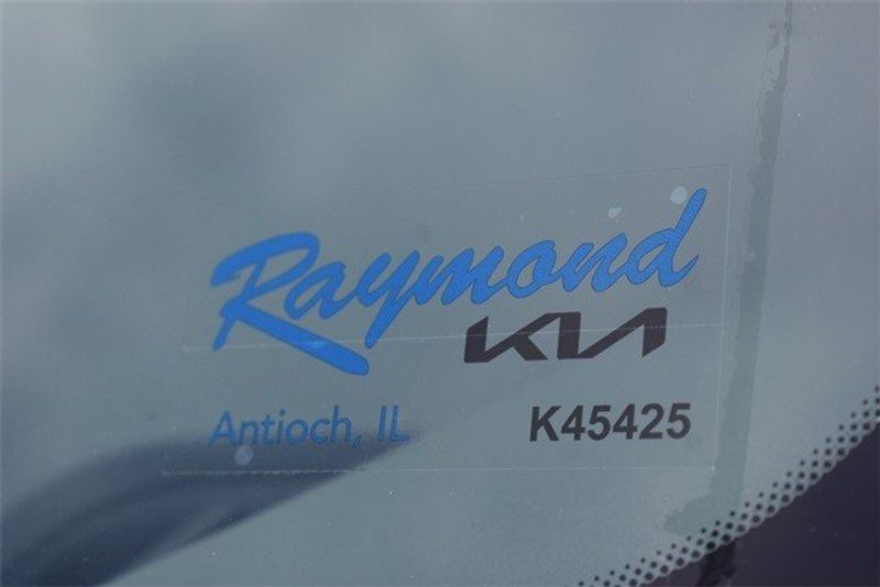2024 Kia Niro EX Premium in a Graphite Gray exterior color and Grayinterior. Raymond Auto Group 888-703-9950 raymonddeals.com 