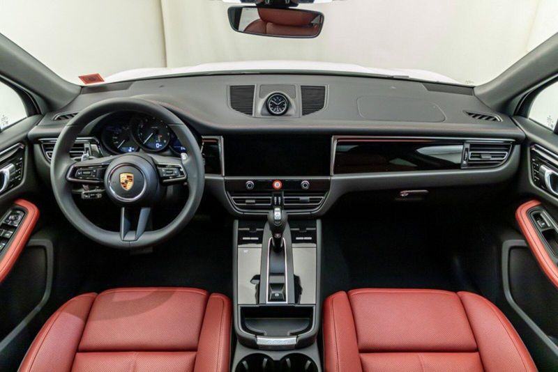 2024 Porsche Macan  in a White exterior color and Black/Bordeaux Redinterior. Lotus Manhattan 347-395-5714 lotusmanhattan.com 