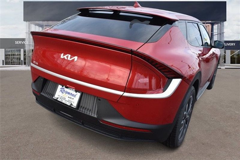 2024 Kia EV6 Light in a Red exterior color and Blk Recycled Fabric &Vegainterior. Raymond Auto Group 888-703-9950 raymonddeals.com 