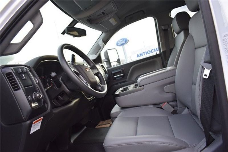 2023 Chevrolet Silverado 4500HD Work Truck in a Summit White exterior color and Dark Ash Seats With Jet Black Interior Accentsinterior. Raymond Auto Group 888-703-9950 raymonddeals.com 