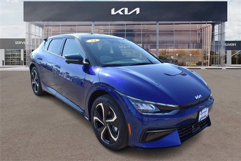 2024 Kia EV6 GT-Line in a Yacht Blue exterior color and Blackinterior. Raymond Auto Group 888-703-9950 raymonddeals.com 