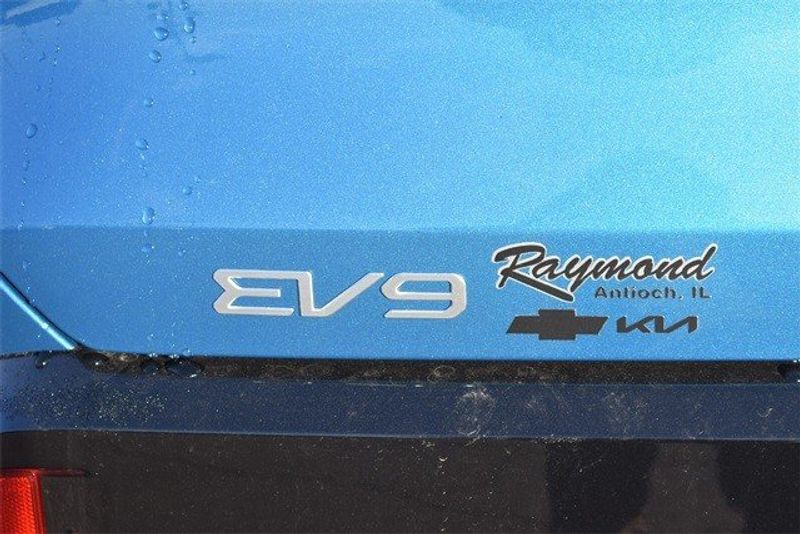 2024 Kia EV9 GT-Line in a Ocean Blue exterior color and Brown/Blackinterior. Raymond Auto Group 888-703-9950 raymonddeals.com 