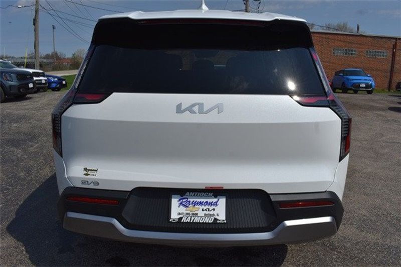 2024 Kia EV9 Light in a White Pearl exterior color and Gry Syntex Lth Seatsinterior. Raymond Auto Group 888-703-9950 raymonddeals.com 