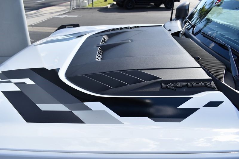2023 Ford Bronco Raptor in a Oxford White exterior color and Black Onyxinterior. BEACH BLVD OF CARS beachblvdofcars.com 