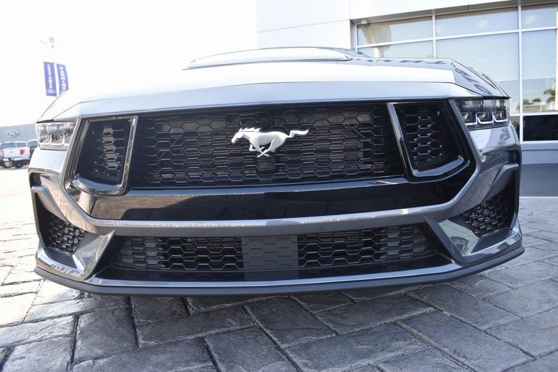 2024 Ford Mustang GT Premium in a Carbonized Gray Metallic exterior color and Black Onyxinterior. BEACH BLVD OF CARS beachblvdofcars.com 