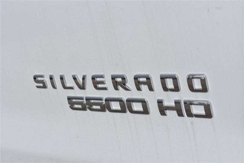 2023 Chevrolet Silverado 5500HD Work Truck in a Summit White exterior color and Dark Ash Seats With Jet Black Interior Accentsinterior. Raymond Auto Group 888-703-9950 raymonddeals.com 