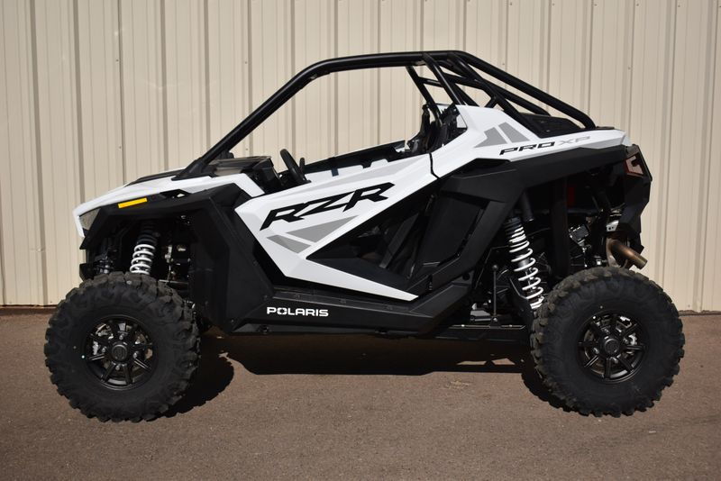2022 POLARIS RZR PRO XP SPORT  WHITE LIGHTNING in a WHITE exterior color. Family PowerSports (877) 886-1997 familypowersports.com 