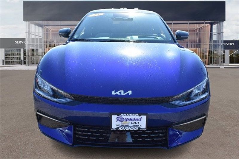 2024 Kia EV6 GT-Line in a Yacht Blue exterior color and Blackinterior. Raymond Auto Group 888-703-9950 raymonddeals.com 