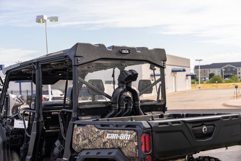 2023 CAN-AM DEFENDER MAX X MR MOSSY OAK BREAK UP COUNTRY CAMO in a CAMO exterior color. Family PowerSports (877) 886-1997 familypowersports.com 